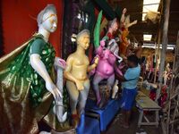 Artisans prepare idols of the Hindu goddess Durga ahead of the Durga Puja festival in Nagaon District, Assam, India, on October 3, 2024. (