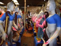 Artisans prepare idols ahead of the Durga Puja festival in Nagaon District of Assam, India, on October 3, 2024. (