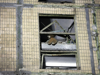 A soft toy is seen in the window of a residential building damaged by a Russian guided missile strike in Kharkiv, Ukraine, on September 3, 2...