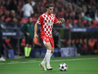 Miguel Gutierrez of Girona FC controls the ball during the UEFA Champions League 2024/25 League Phase MD2 match between Girona FC and Feyeno...