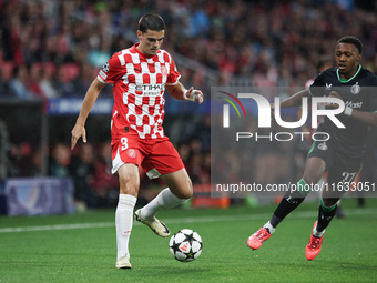 Miguel Gutierrez of Girona FC controls the ball during the UEFA Champions League 2024/25 League Phase MD2 match between Girona FC and Feyeno...