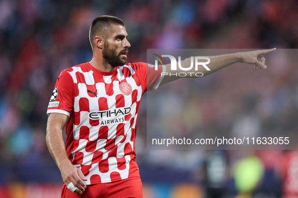 David Lopez of Girona FC participates in the UEFA Champions League 2024/25 League Phase MD2 match between Girona FC and Feyenoord at Estadi...