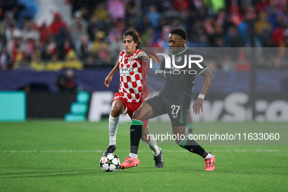 Antoni Milambo of Feyenoord fights for the ball against Bryan Gil of Girona FC during the UEFA Champions League 2024/25 League Phase MD2 mat...