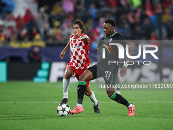 Antoni Milambo of Feyenoord fights for the ball against Bryan Gil of Girona FC during the UEFA Champions League 2024/25 League Phase MD2 mat...