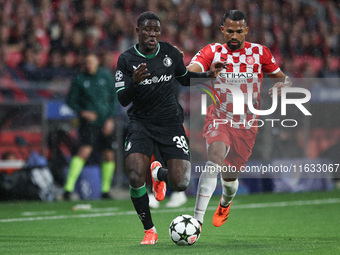 Ibrahim Osman of Feyenoord controls the ball while defended by Herrera of Girona FC during the UEFA Champions League 2024/25 League Phase MD...