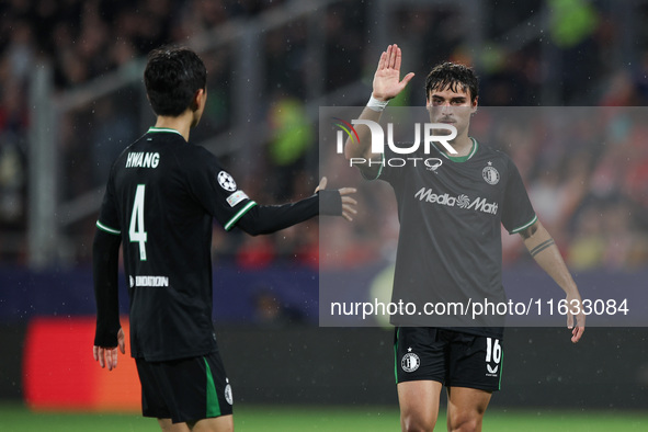 Hugo Bueno of Feyenoord celebrates a goal with Inbeom Hwang of Feyenoord during the UEFA Champions League 2024/25 League Phase MD2 match bet...