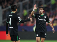 Hugo Bueno of Feyenoord celebrates a goal with Inbeom Hwang of Feyenoord during the UEFA Champions League 2024/25 League Phase MD2 match bet...