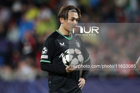 Ayase Ueda of Feyenoord has the ball during the UEFA Champions League 2024/25 League Phase MD2 match between Girona FC and Feyenoord at Esta...