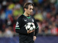 Ayase Ueda of Feyenoord has the ball during the UEFA Champions League 2024/25 League Phase MD2 match between Girona FC and Feyenoord at Esta...