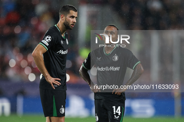 Igor Paixao of Feyenoord talks with David Hancko of Feyenoord during the UEFA Champions League 2024/25 League Phase MD2 match between Girona...