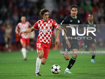 Bryan Gil of Girona FC controls the ball during the UEFA Champions League 2024/25 League Phase MD2 match between Girona FC and Feyenoord at...