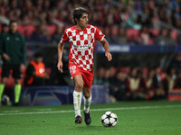 Bryan Gil of Girona FC controls the ball during the UEFA Champions League 2024/25 League Phase MD2 match between Girona FC and Feyenoord at...