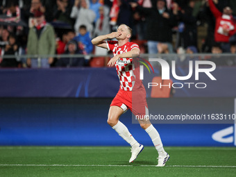 Van de Beek of Girona FC celebrates after scoring a goal during the UEFA Champions League 2024/25 League Phase MD2 match between Girona FC a...