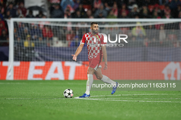 David Lopez of Girona FC controls the ball during the UEFA Champions League 2024/25 League Phase MD2 match between Girona FC and Feyenoord a...