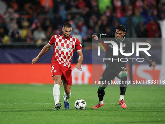 David Lopez of Girona FC controls the ball during the UEFA Champions League 2024/25 League Phase MD2 match between Girona FC and Feyenoord a...