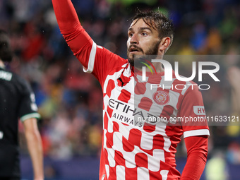 Portu of Girona FC plays during the UEFA Champions League 2024/25 League Phase MD2 match between Girona FC and Feyenoord at Estadi Montilivi...