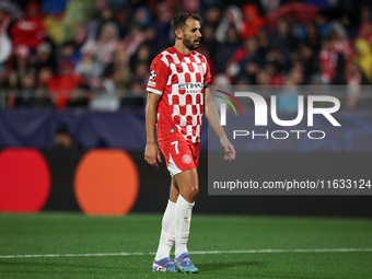 Stuani of Girona FC participates in the UEFA Champions League 2024/25 League Phase MD2 match between Girona FC and Feyenoord at Estadi Monti...