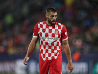 David Lopez of Girona FC participates in the UEFA Champions League 2024/25 League Phase MD2 match between Girona FC and Feyenoord at Estadi...