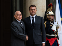 President of the French Republic Emmanuel Macron holds a bilateral meeting with Norodom Sihamoni, King of Cambodia, in Paris, France, on Oct...