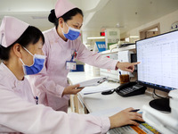 A medical staff member works at his post in the neonatology department of East Hospital in Lianyungang, China, on October 3, 2024. (