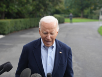 President Biden takes questions from the press about Israel and Iran as he boards Marine One, on October 3, 2024. (