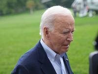 President Biden takes questions from the press about Israel and Iran as he boards Marine One, on October 3, 2024. (