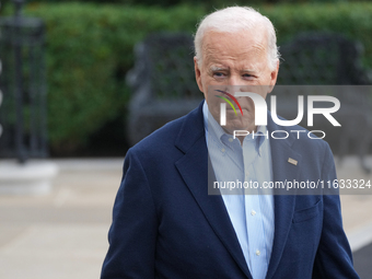 President Biden takes questions from the press about Israel and Iran as he boards Marine One, on October 3, 2024. (