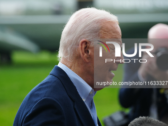 President Biden takes questions from the press about Israel and Iran as he boards Marine One, on October 3, 2024. (