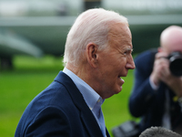 President Biden takes questions from the press about Israel and Iran as he boards Marine One, on October 3, 2024. (