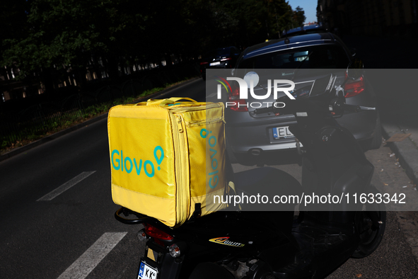 Glovo bag is seen on a scooter in Krakow, Poland on October 1, 2024. 