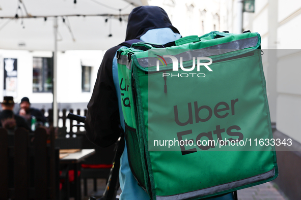 Uber Eats courier is seen in Krakow, Poland on October 1, 2024. 