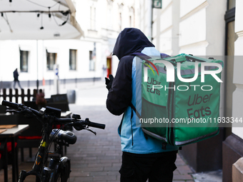 Uber Eats courier is seen in Krakow, Poland on October 1, 2024. (