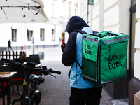 Uber Eats courier is seen in Krakow, Poland on October 1, 2024. (