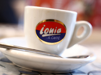 Ionia logo is seen on a cup of coffee in a cafe in this illustration photo taken in Krakow, Poland on October 2, 2024. (