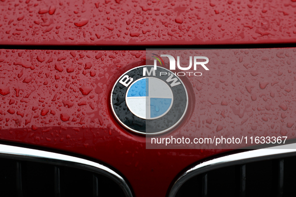 BMW logo is seen on a car in Krakow, Poland on October 2, 2024. 