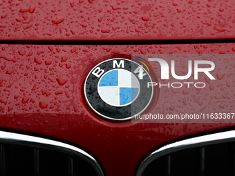 BMW logo is seen on a car in Krakow, Poland on October 2, 2024. (