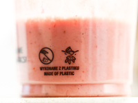 A sign is seen on a plastic cup in this illustration photo taken in Krakow, Poland on October 2, 2024. (