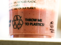 A sign is seen on a plastic cup in this illustration photo taken in Krakow, Poland on October 2, 2024. (