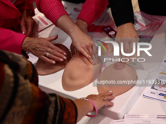 Breast models used for cancer detection testing are seen in a stand during the cancer prevention campaign in a shopping mall in Krakow, Pola...