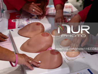 Breast models used for cancer detection testing are seen in a stand during the cancer prevention campaign in a shopping mall in Krakow, Pola...