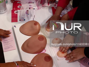 Breast models used for cancer detection testing are seen in a stand during the cancer prevention campaign in a shopping mall in Krakow, Pola...