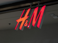 H&M logo is seen in a shopping mall in Krakow, Poland on October 2, 2024. (