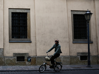 A person rides a bike in Krakow, Poland on October 3, 2024. (