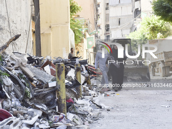 A view shows the destruction of the building and surrounding structures after Israeli warplanes hit a building for the Islamic Health Author...