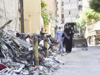 A view shows the destruction of the building and surrounding structures after Israeli warplanes hit a building for the Islamic Health Author...