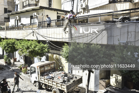 A view shows the destruction of the building and surrounding structures after Israeli warplanes hit a building for the Islamic Health Author...