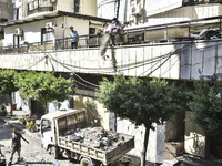 A view shows the destruction of the building and surrounding structures after Israeli warplanes hit a building for the Islamic Health Author...