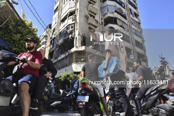 A view shows the destruction of the building and surrounding structures after Israeli warplanes hit a building for the Islamic Health Author...