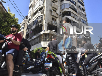 A view shows the destruction of the building and surrounding structures after Israeli warplanes hit a building for the Islamic Health Author...