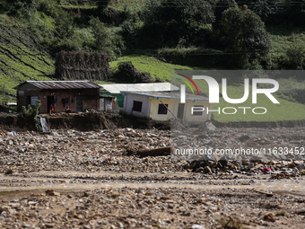 A view of the house damaged by the flood due to heavy rain in a village in Lalitpur district on the outskirts of Kathmandu, Nepal, on Octobe...